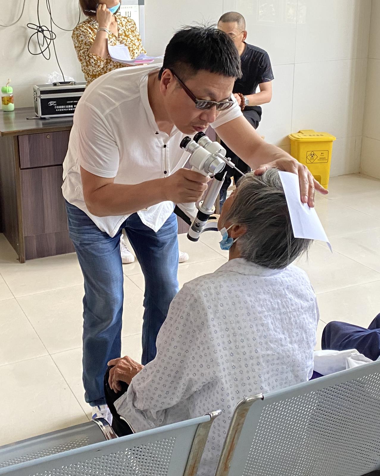 新建镇残联开展白内障免费筛查义诊活动.jpg