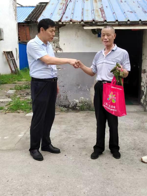 连心家园 粽情端午——宜兴市万石镇残联端午佳节为残疾人送安康.jpg