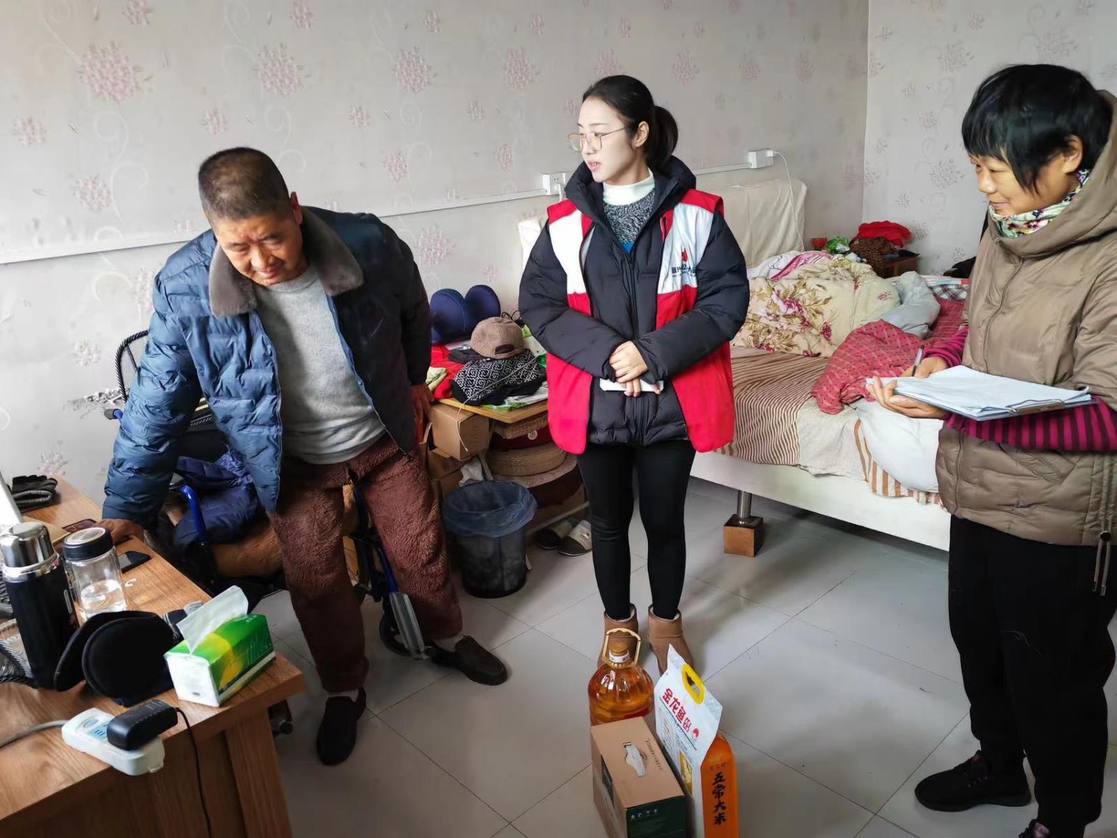 寒冬时节送温暖  浓浓关爱显温情  ----宜兴市屺亭街道残联开展雪天走访慰问残疾人活动.jpg