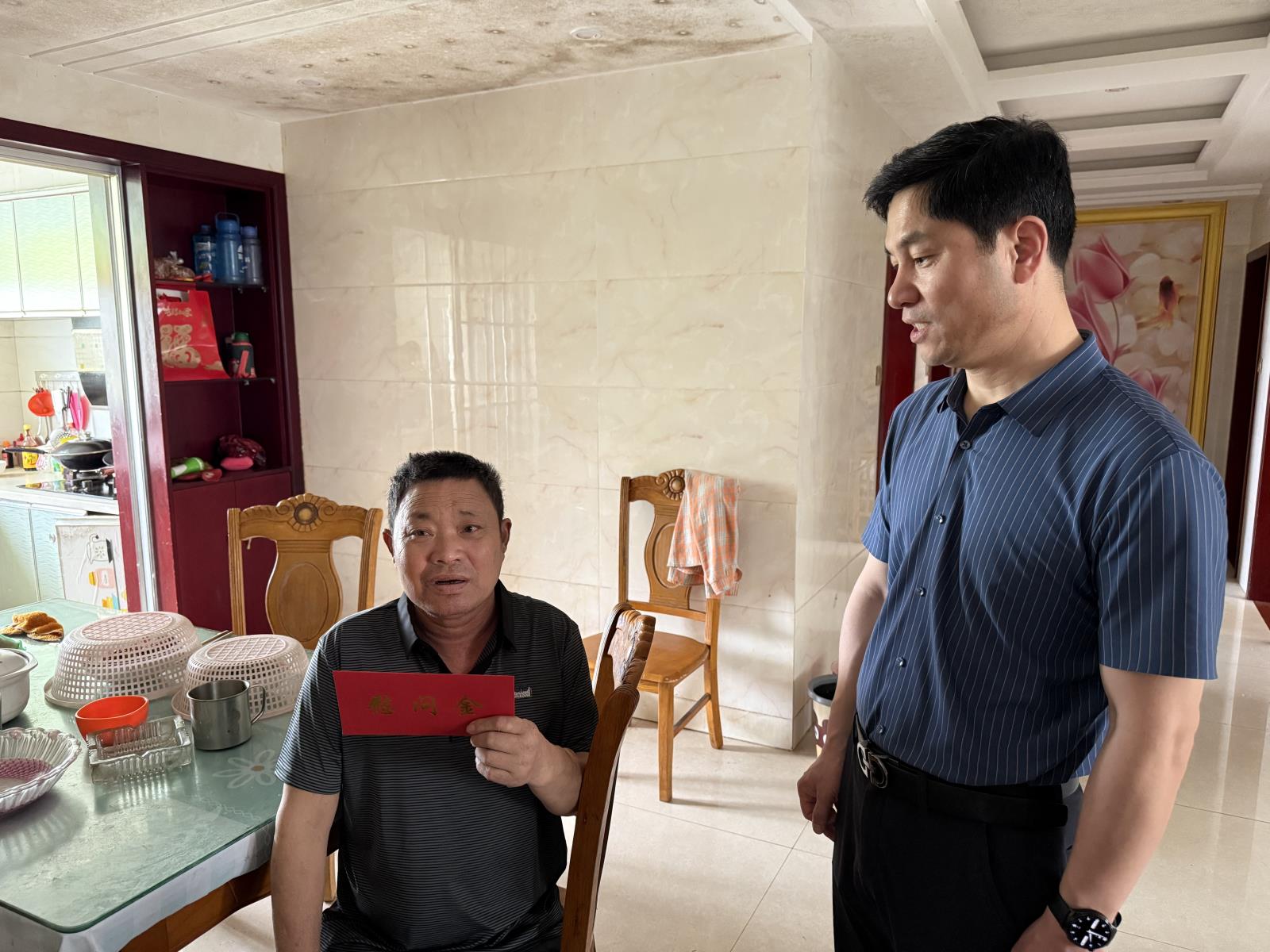 芳桥街道残联开展“助残日”走访慰问残疾人活动docx.jpg